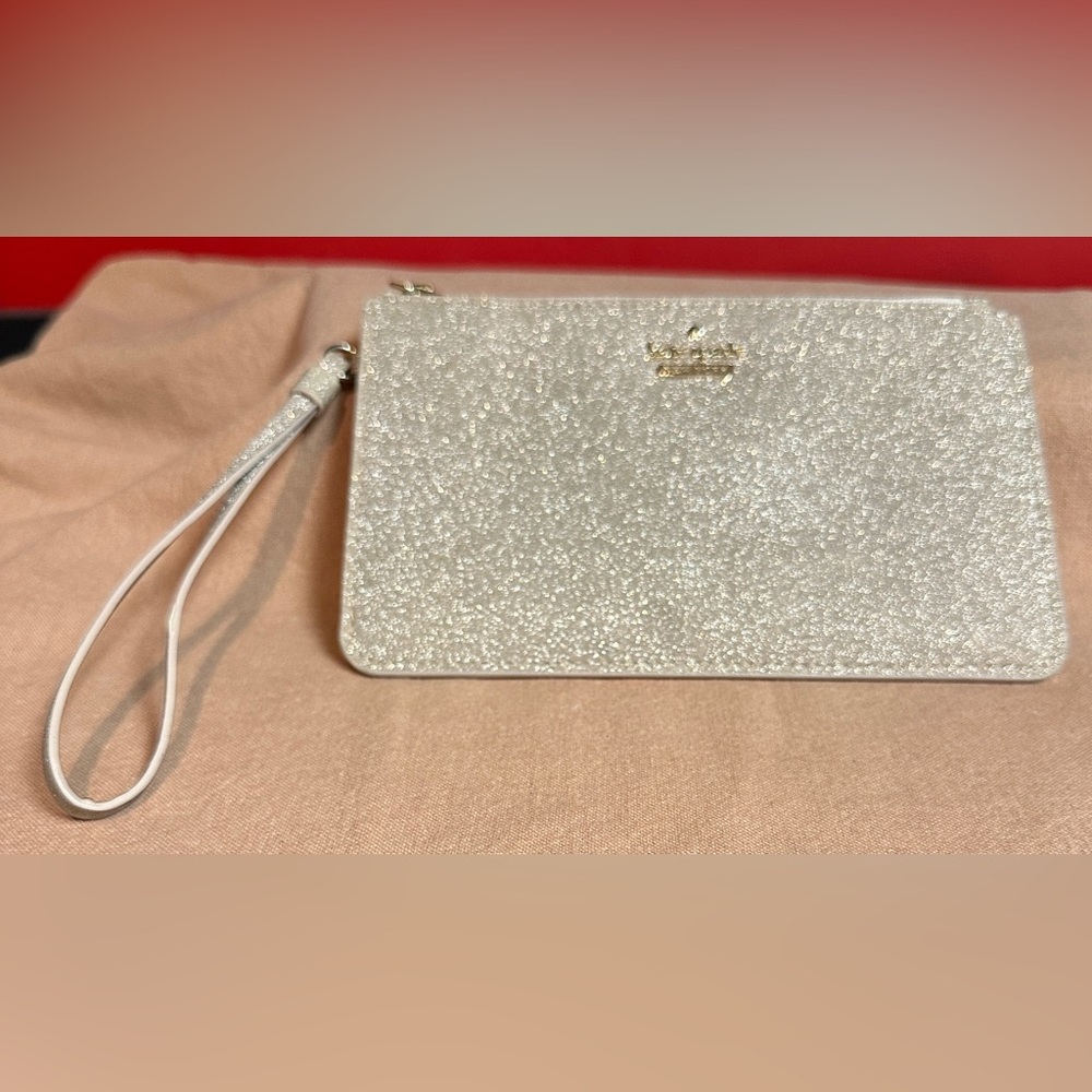 Kate Spade Champagne Glitter Wristlet with Top Zip Close Approximately 7”x4”x.5”